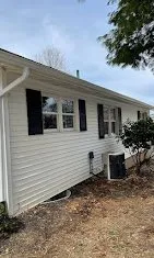 Slide of Blue Roofing and Gutters
