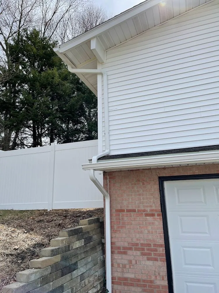 Slide of Blue Roofing and Gutters