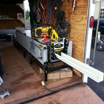 Slide of Blue Roofing and Gutters