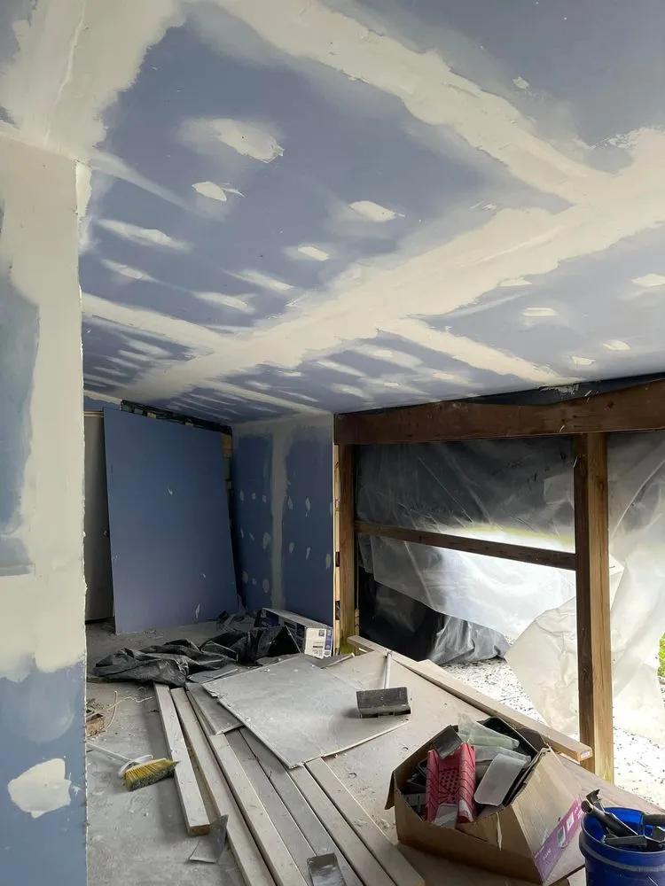 Slide of blue strip roofing and restoration