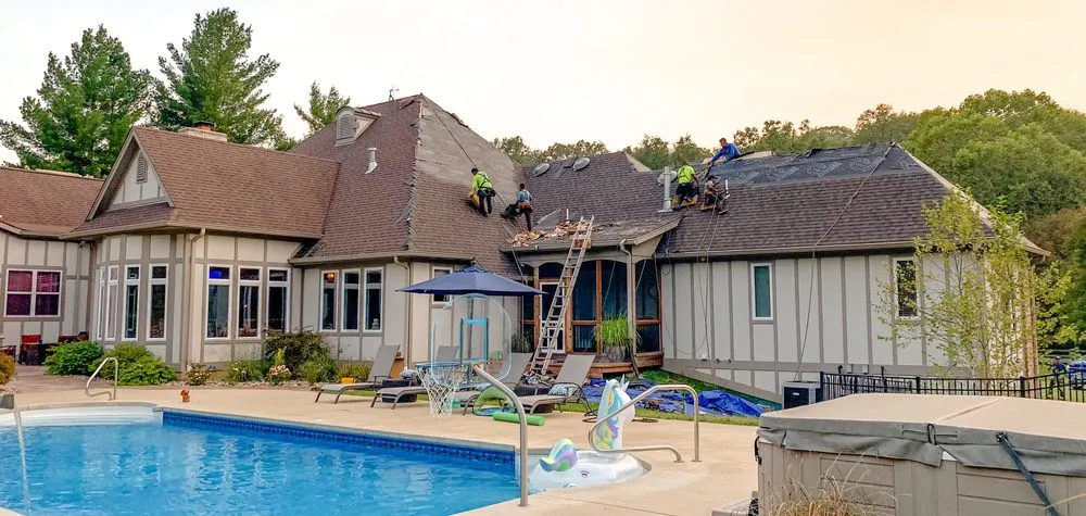 Professional roof repair with free inspection in St. Peters, MO by Bluebird Construction