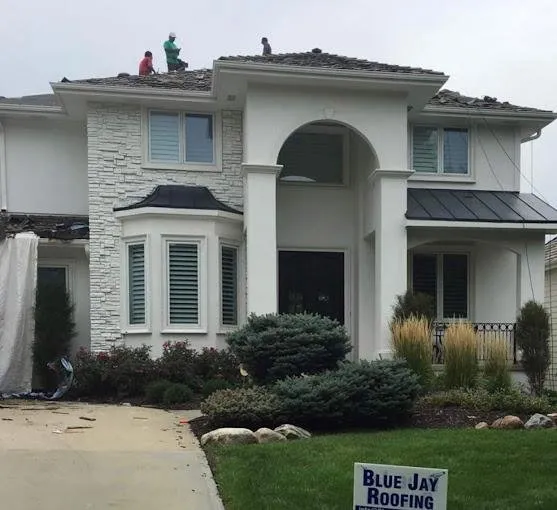 Slide of Bluejay Roofing