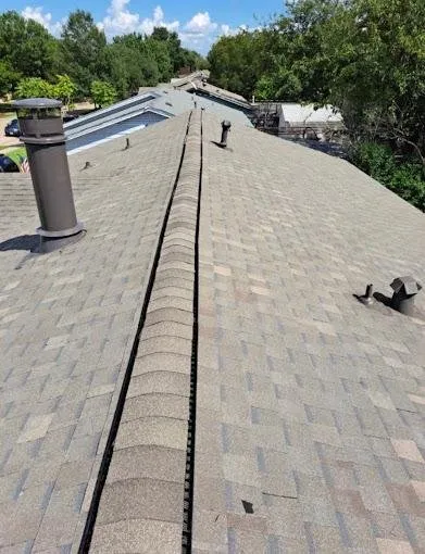 Slide of Bluejay Roofing