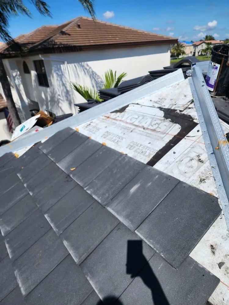 Slide of BMG Roofing