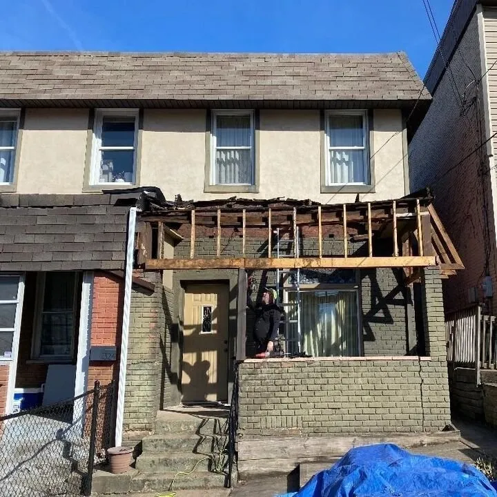 Slide of Bob Romea Roofing