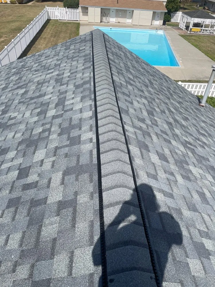 Slide of Bob Romea Roofing