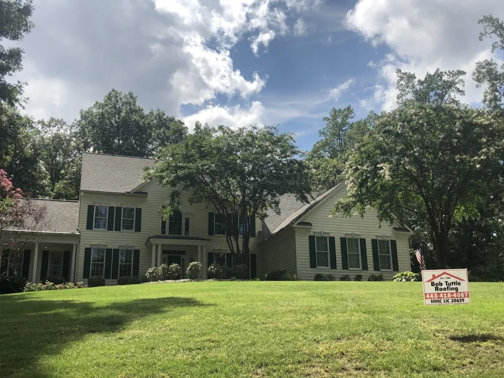 Slide of Bob Tuttle Roofing