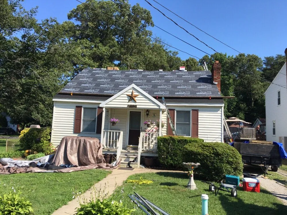 Slide of Bob Tuttle Roofing