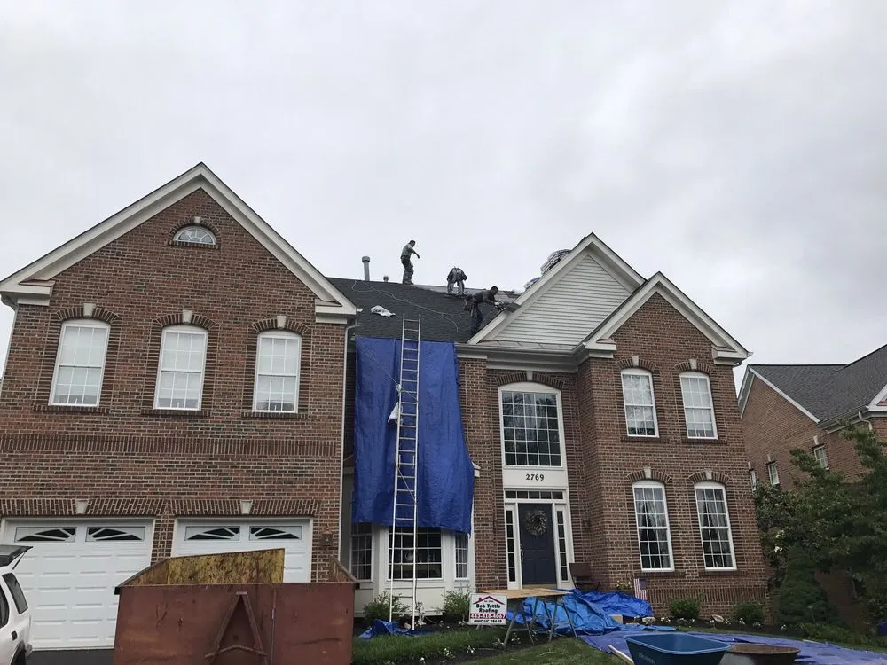 Slide of Bob Tuttle Roofing