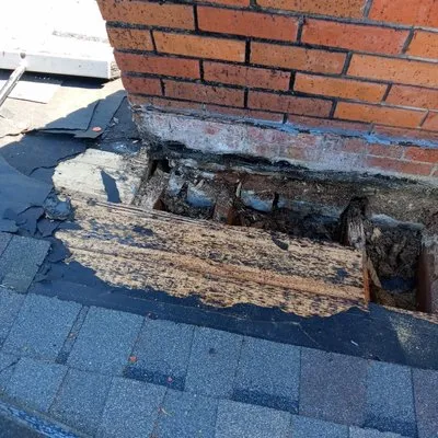 Bobby Hills Roofing & Repairs Logo