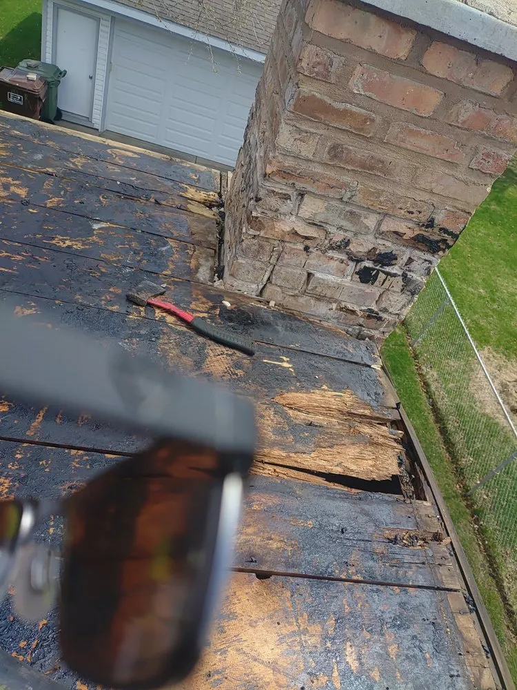 Slide of Bob's Roofing Crew