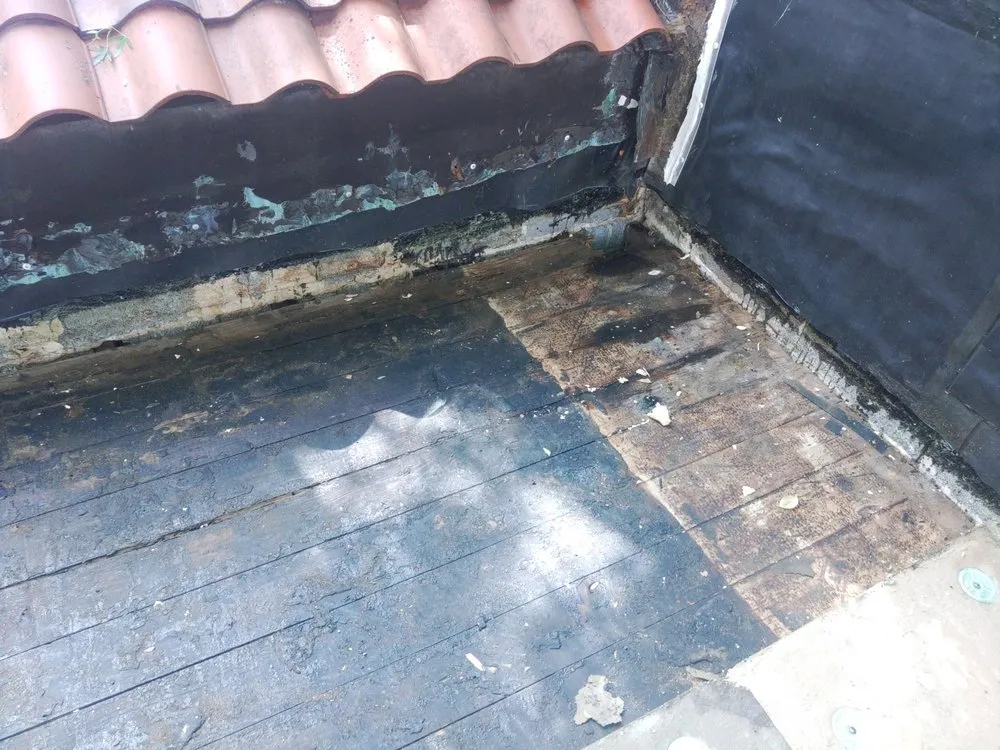 Slide of Bob's Roofing Crew