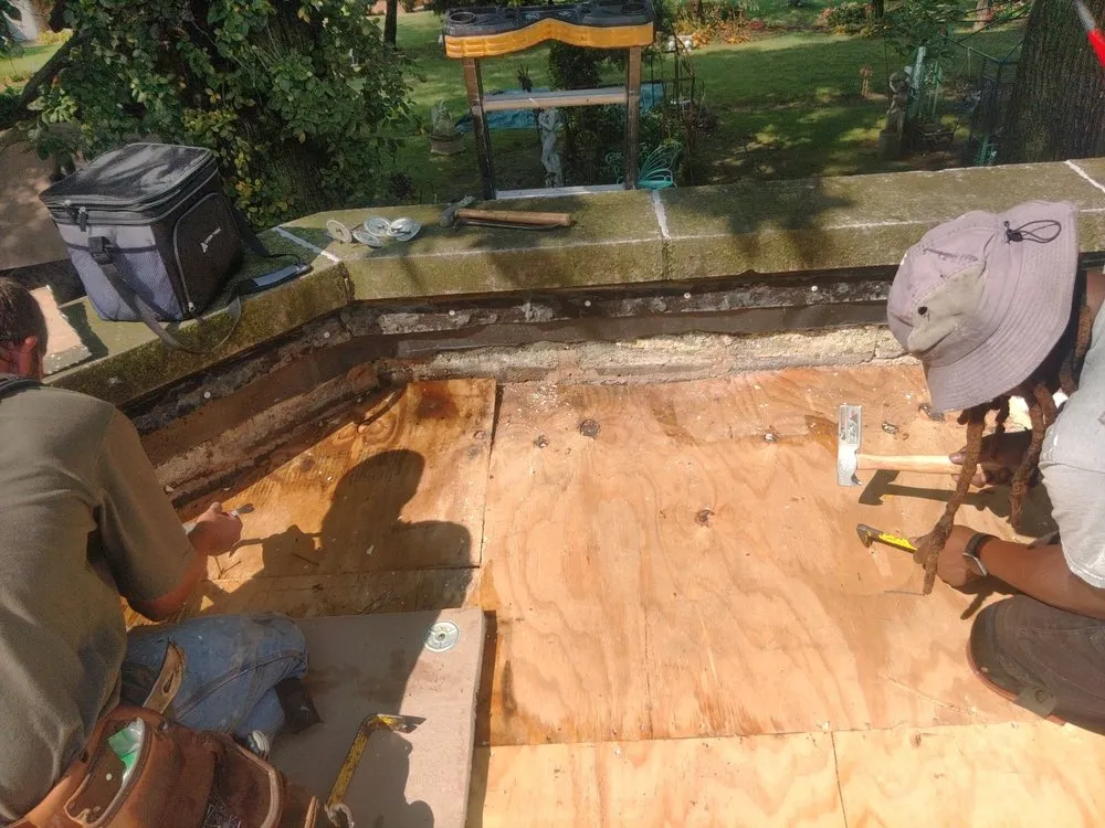 Slide of Bob's Roofing Crew