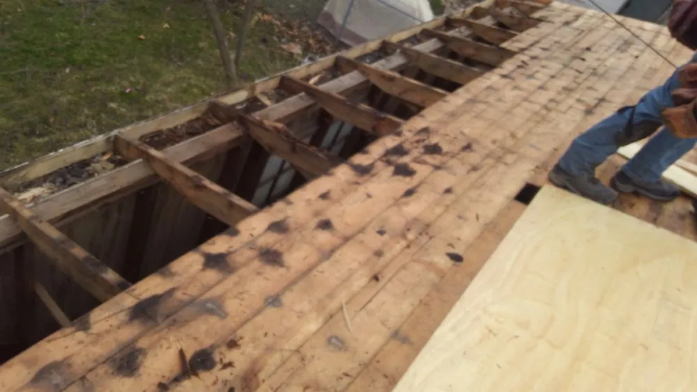 Slide of Bob's Roofing Crew