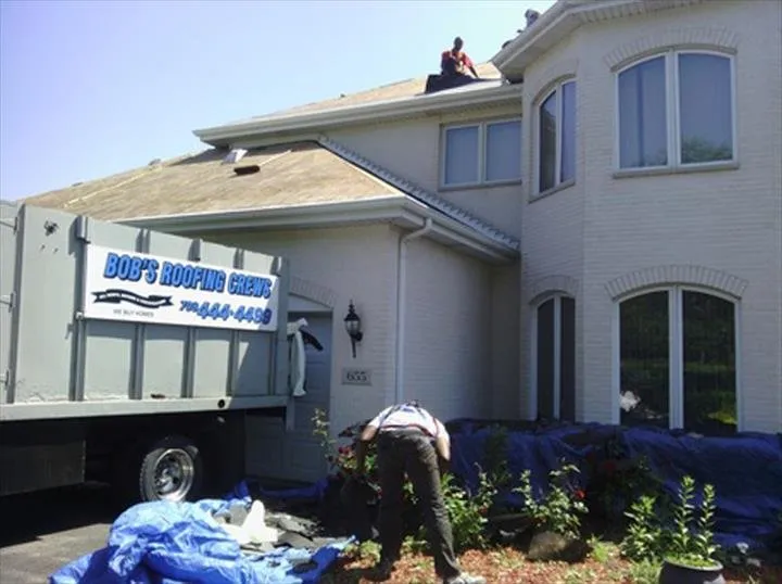 Slide of Bob's Roofing Crew