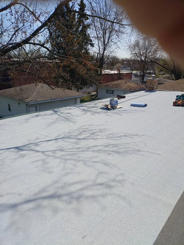 Slide of Bob's Roofing Crew