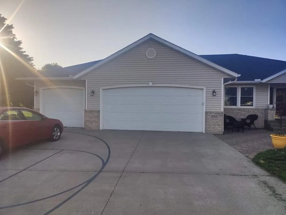 Licensed storm damage roof repair for homes in Green Isle, MN by Bohlmann Exteriors