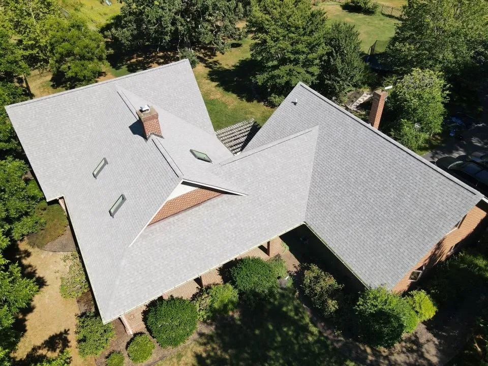 Licensed roof installation after storm damage in Powhatan, VA by Bon Air Exteriors