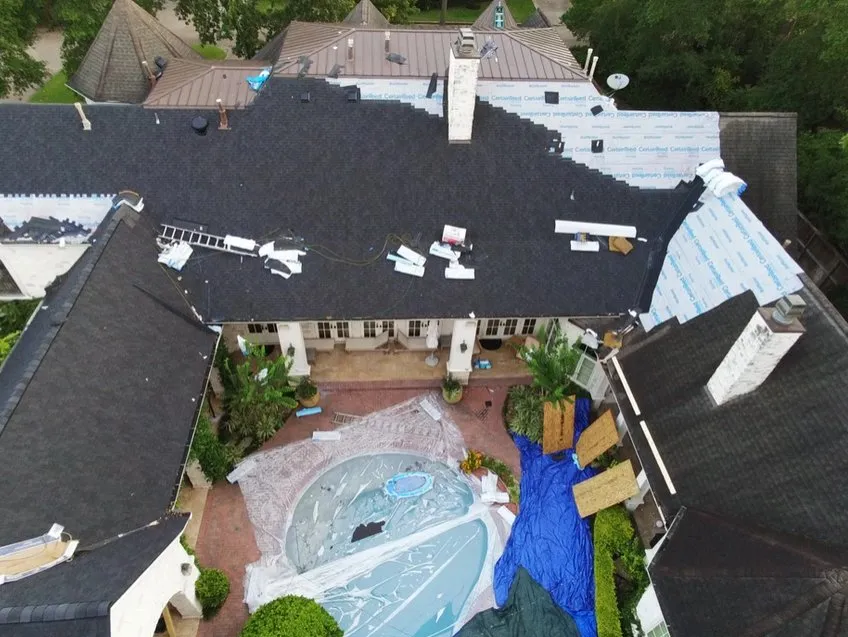 Slide of Bone Dry Roofing and Restoration