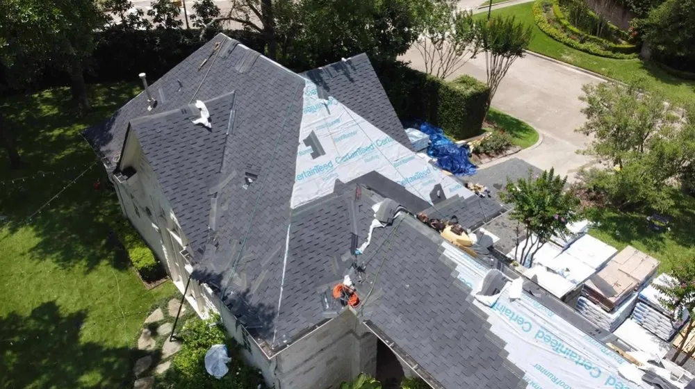 Slide of Bone Dry Roofing and Restoration