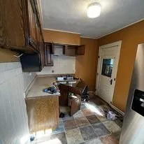 Slide of Boots On The Ground Construction & Investments