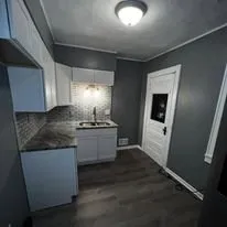 Slide of Boots On The Ground Construction & Investments