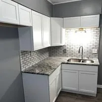 Slide of Boots On The Ground Construction & Investments