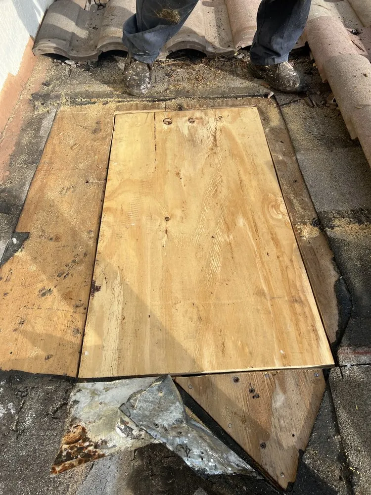 Slide of Borja Roofing