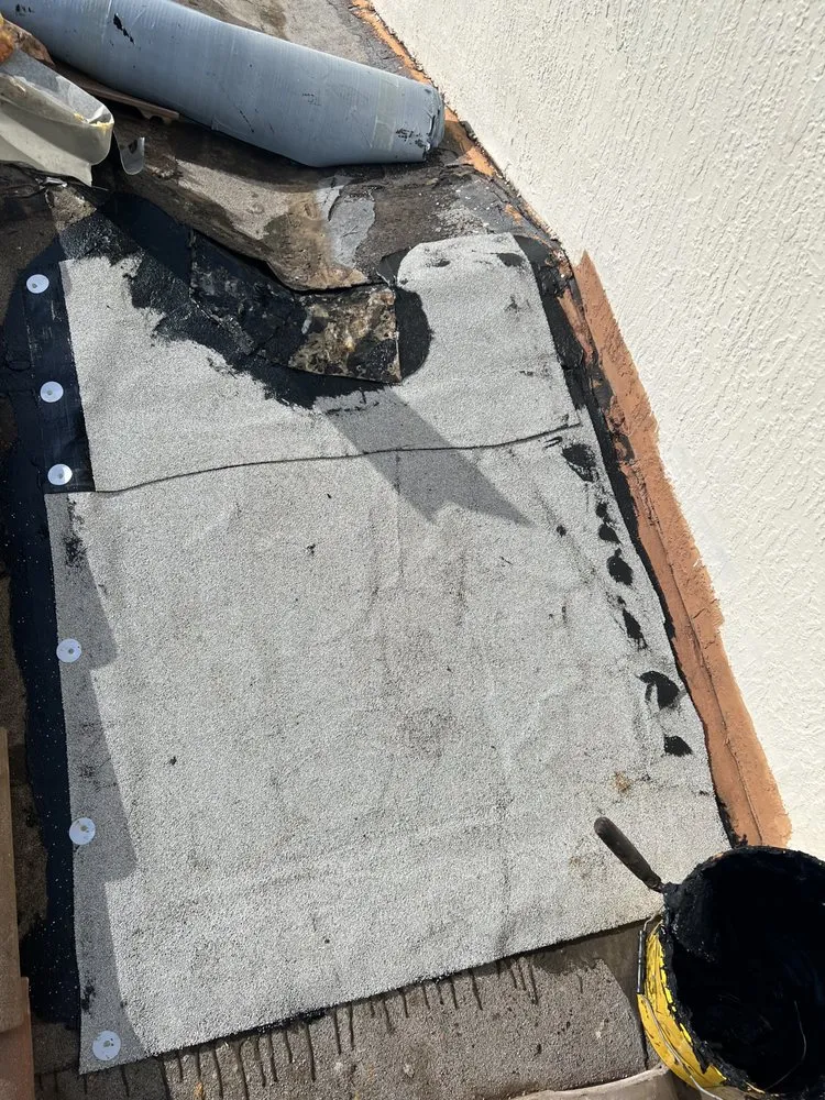 Slide of Borja Roofing