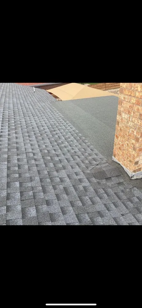 Slide of Boss Roofing