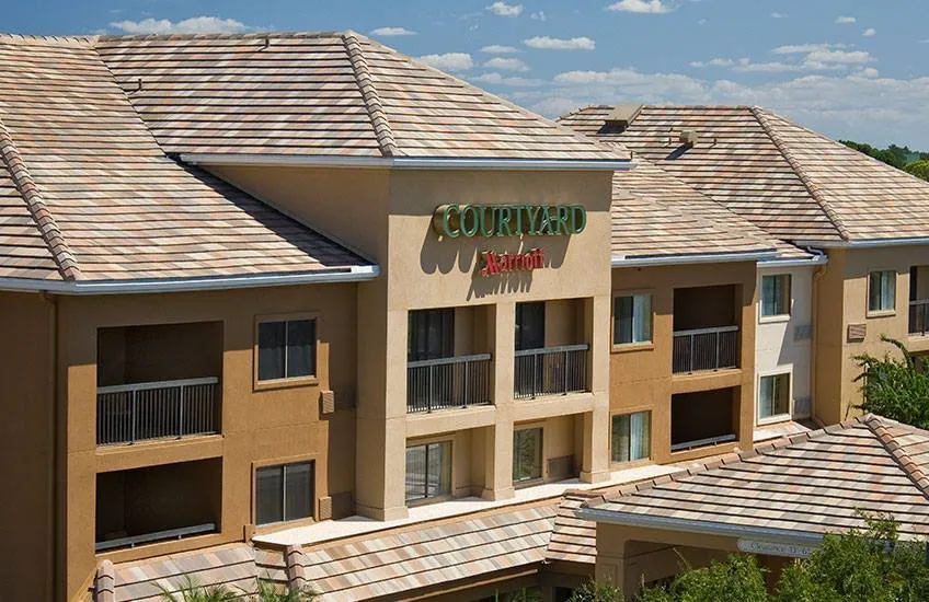 Slide of Boss Roofing Experts