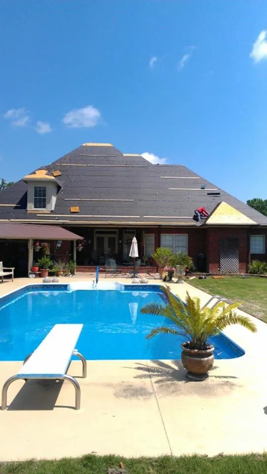 Slide of Bossman Roofing by Chad Rascoe