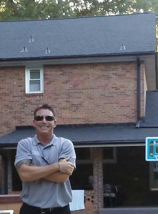 Slide of Bossman Roofing by Chad Rascoe