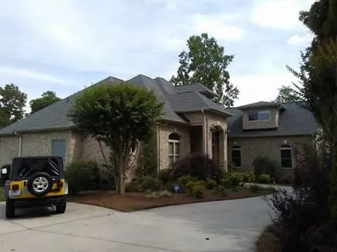 Slide of Bossman Roofing by Chad Rascoe