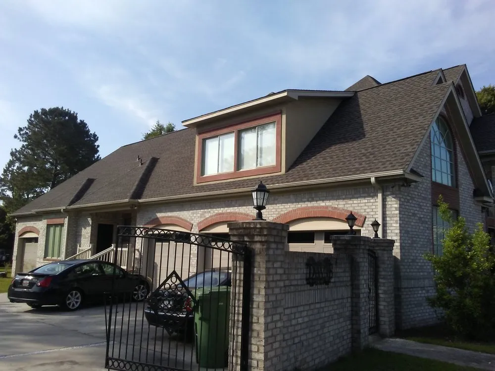 Slide of Bossman Roofing by Chad Rascoe