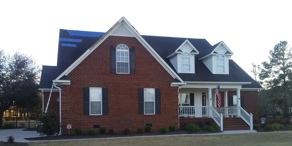 Slide of Bossman Roofing by Chad Rascoe