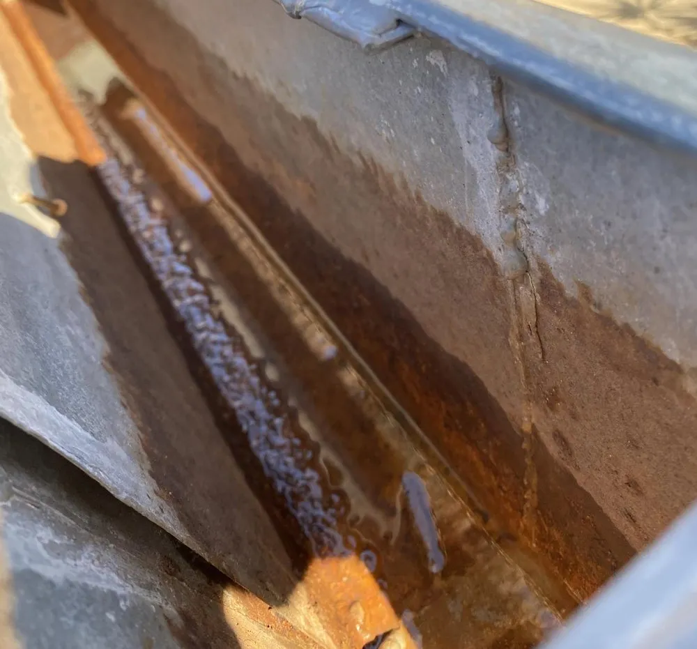 Slide of Bossmans Gutters & Repairs