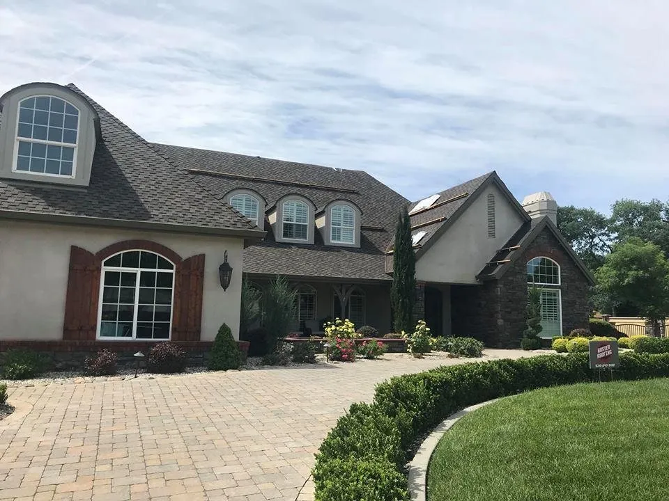 Slide of Boster Roofing