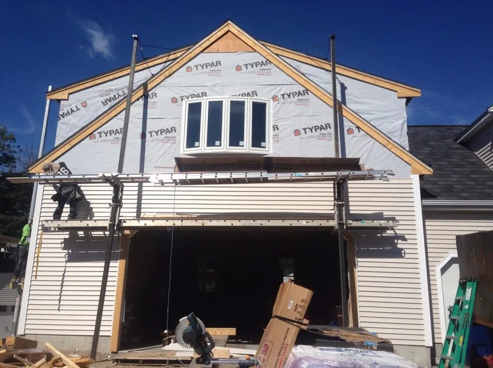 Licensed flat roof repair for residential properties in Hunstville, TX by Bosworth Roofing