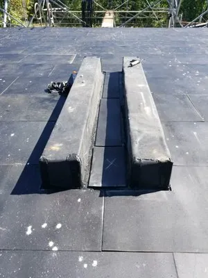 Bottom To Top Construction Logo