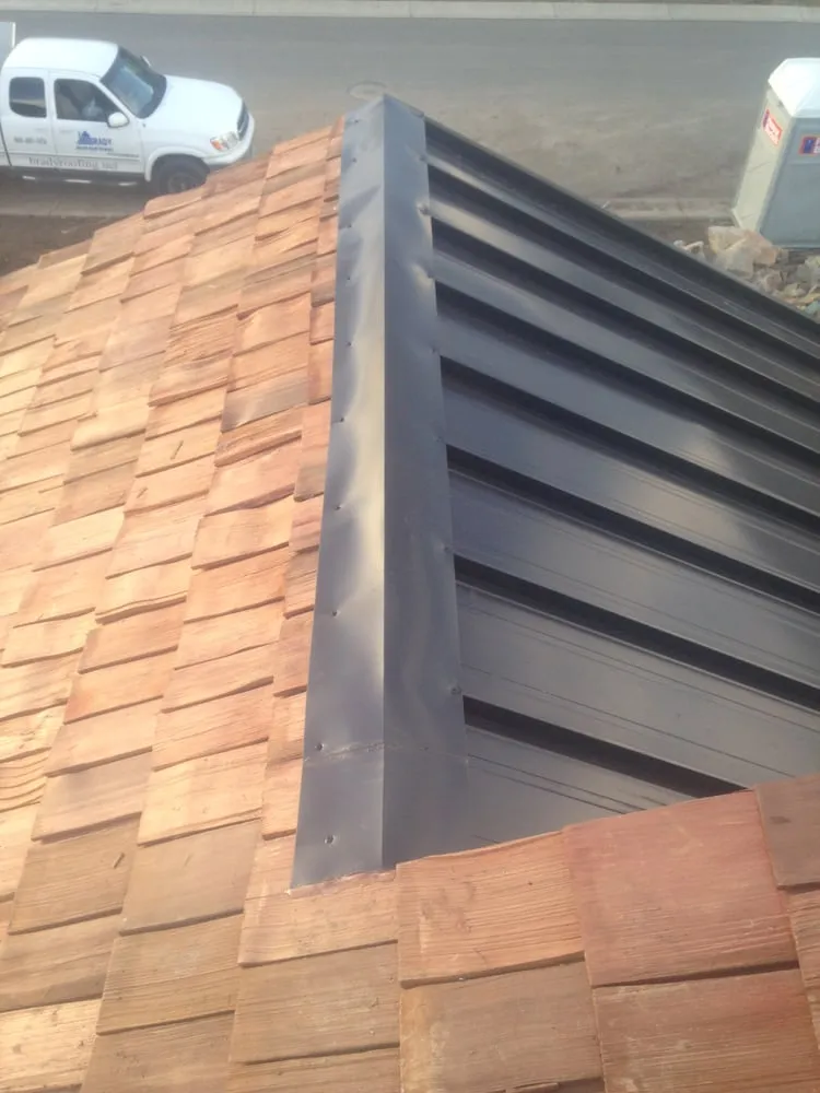 Slide of Brady Roofing