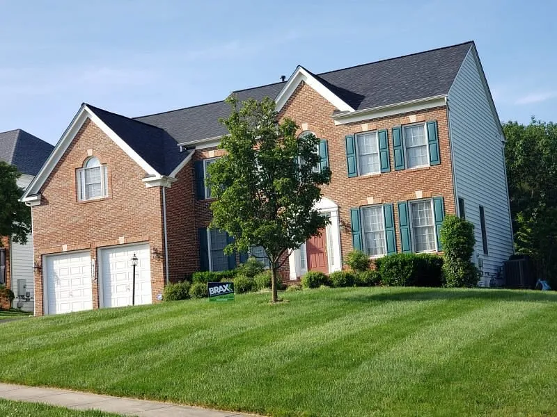 Slide of BRAX Roofing