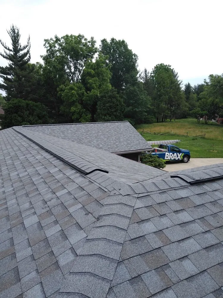 Slide of BRAX Roofing