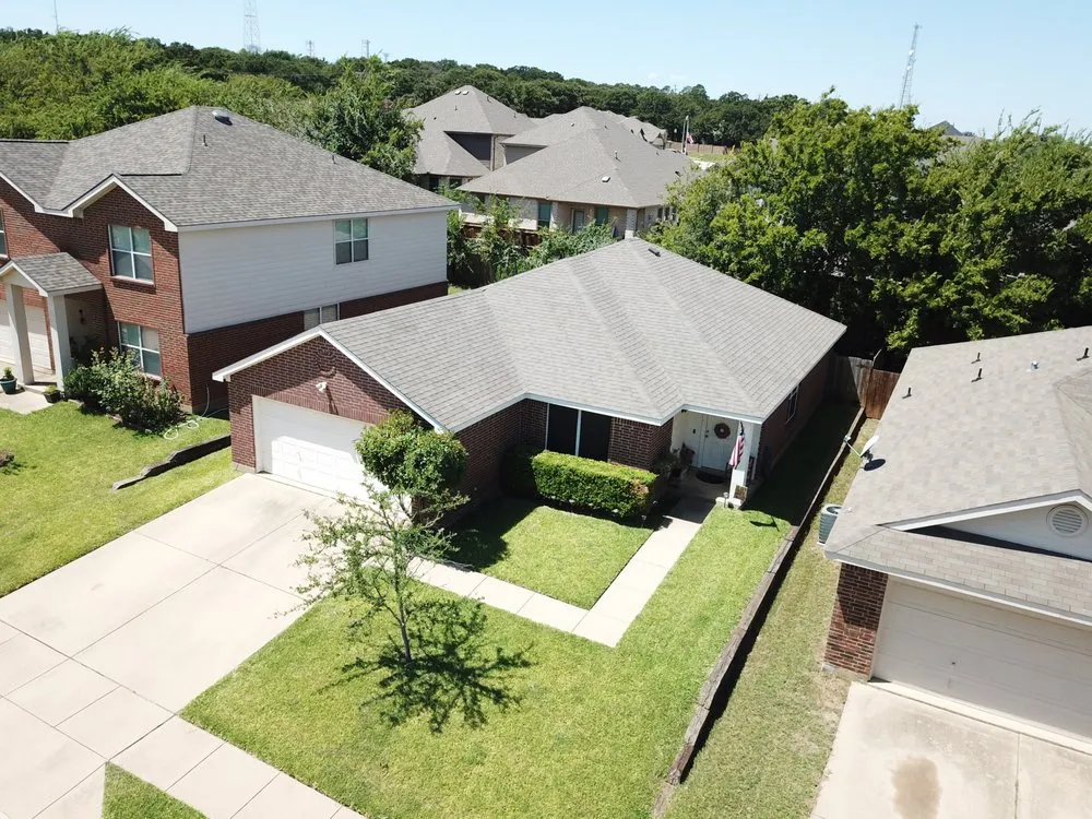 Slide of Breeze Roofing & Restoration