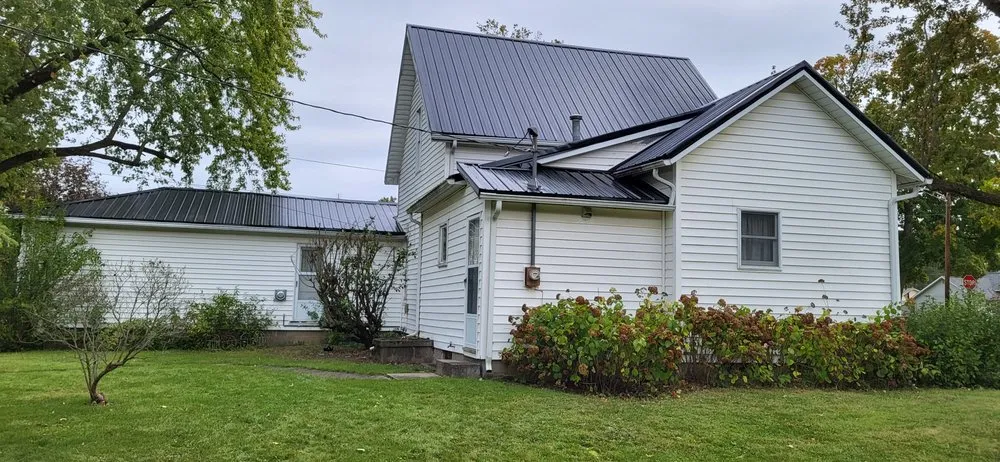 Slide of Breezewood Commercial Roofing