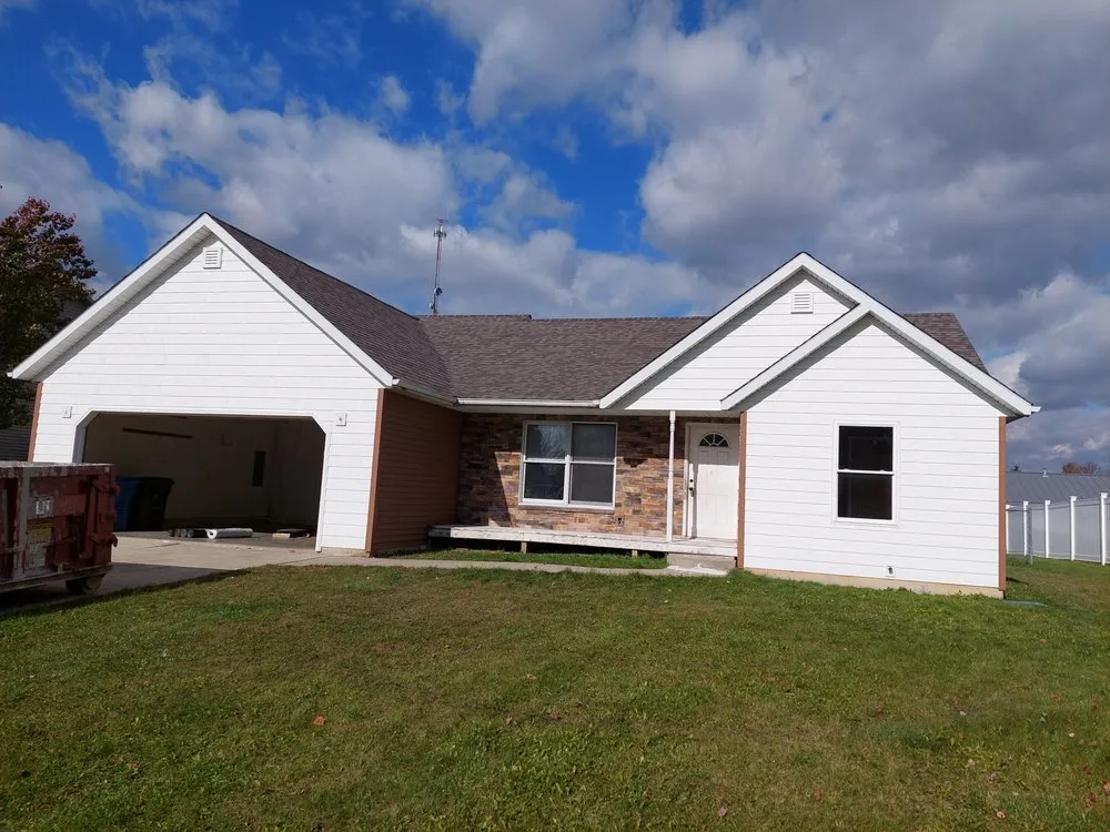 Slide of Breezewood Commercial Roofing