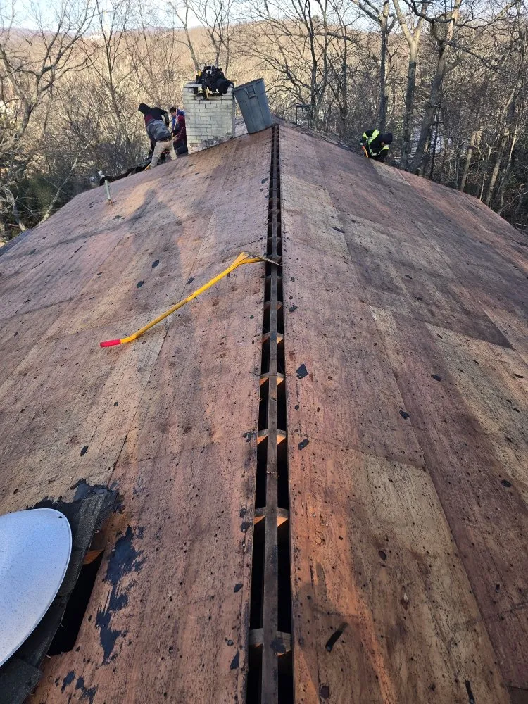 Slide of Brennan Roofing & Contracting