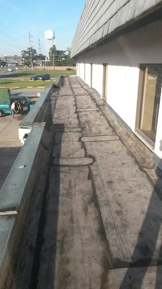 Slide of Brennan's Roofing