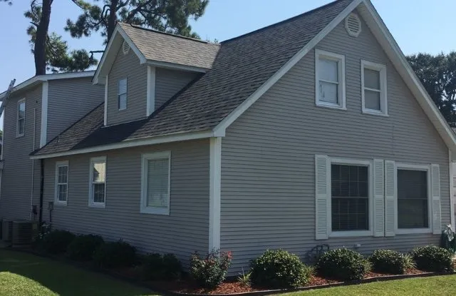 Slide of Brennan's Roofing