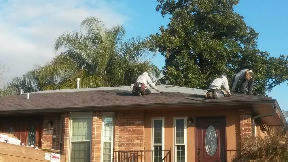 Slide of Brennan's Roofing